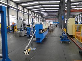 Extrusion line for wire and cable coating